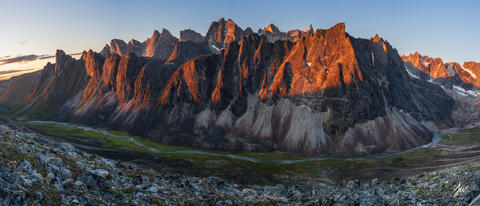 Sunrise panorama of the Arrigetch Peaks in Gates of the Arctic National Park, Alaska.