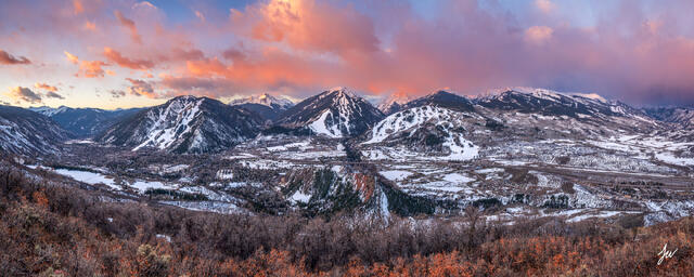 A rare aerial view showing all four Aspen ski resorts: Aspen Mountain, Aspen Highlands, Snowmass, and Buttermilk