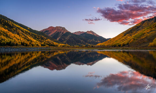 Crystal Lake near Ouray in the San Juan Mountains, surrounded by bright autumn foliage and rugged peaks