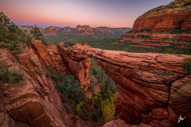 Sunrise over Devil's Bridge in Sedona, Arizona.