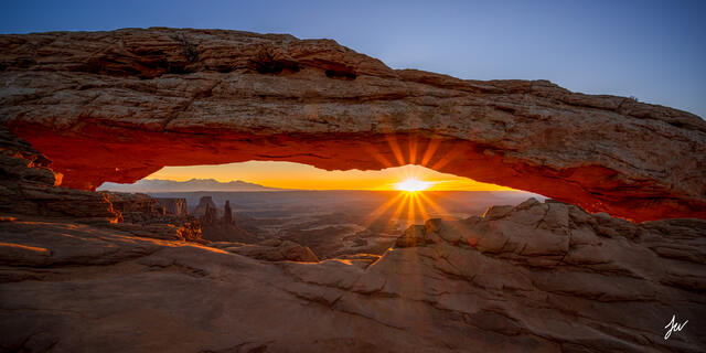 Sunrise at Mesa Arch in Canyonlands National Park in Utah.