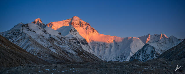 Wide-angle view of Mount Everest North Side Base Camp in Tibet, set against the expansive Himalayan mountains.