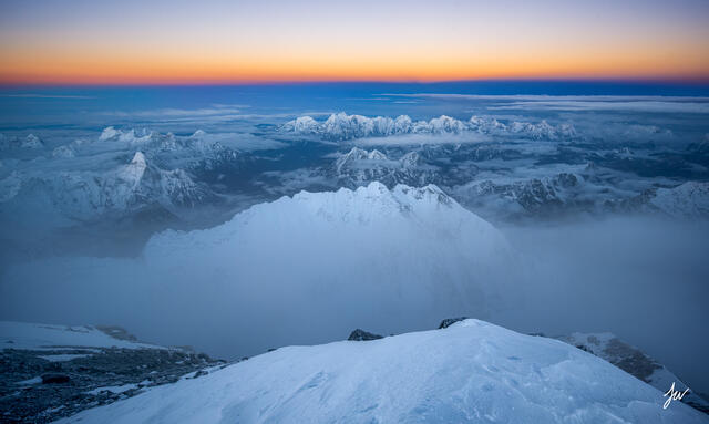 Sunrise photographed from summit of Mount Everest. 