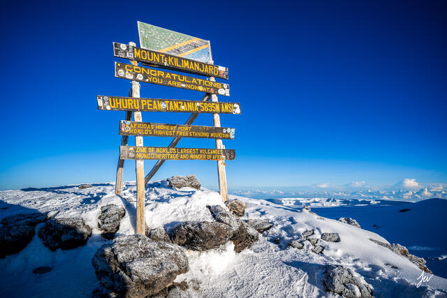 Summit sign at Mount Kilimanjaro photographed near Uhuru Peak, the highest point in Africa.