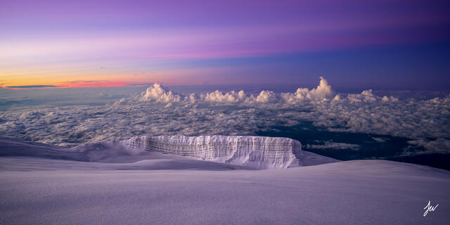 Sunrise over glacier ice near the summit of Mount Kilimanjaro, Africa’s highest mountain.
