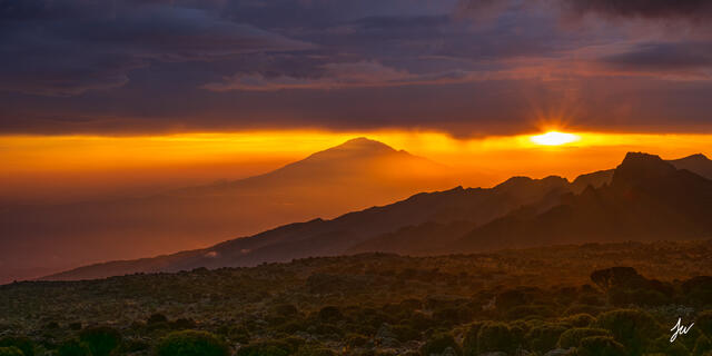 Sunset view of Mount Meru seen from Mount Kilimanjaro in Tanzania.