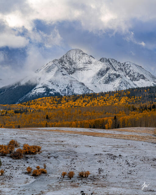 Wilson Mesa fall colors and fresh snow in Telluride, Colorado, with golden aspens and mountain scenery.