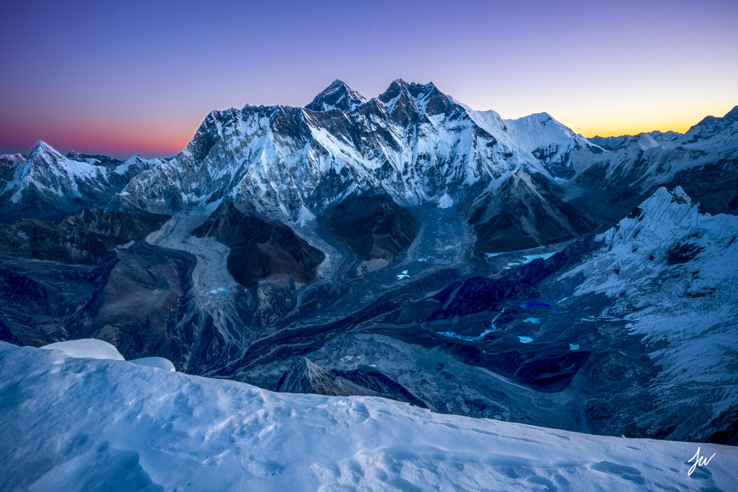 Sunrise on Mt. Everest from summit of Ama Dablam in Nepal. 