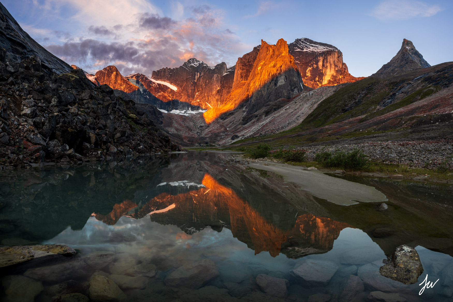 Arrigetch Peaks sunrise reflection in Gates of the Arctic National Park, Alaska.