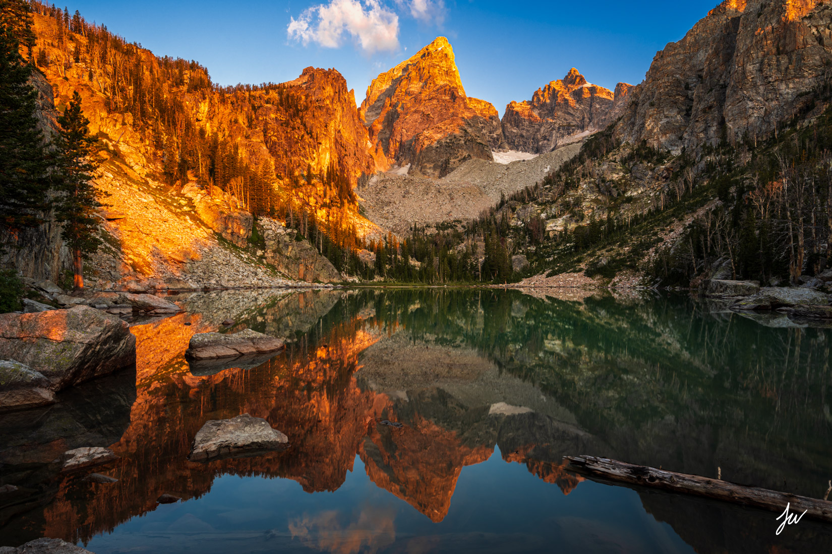 Grand Teton sunrise reflection in Wyoming.