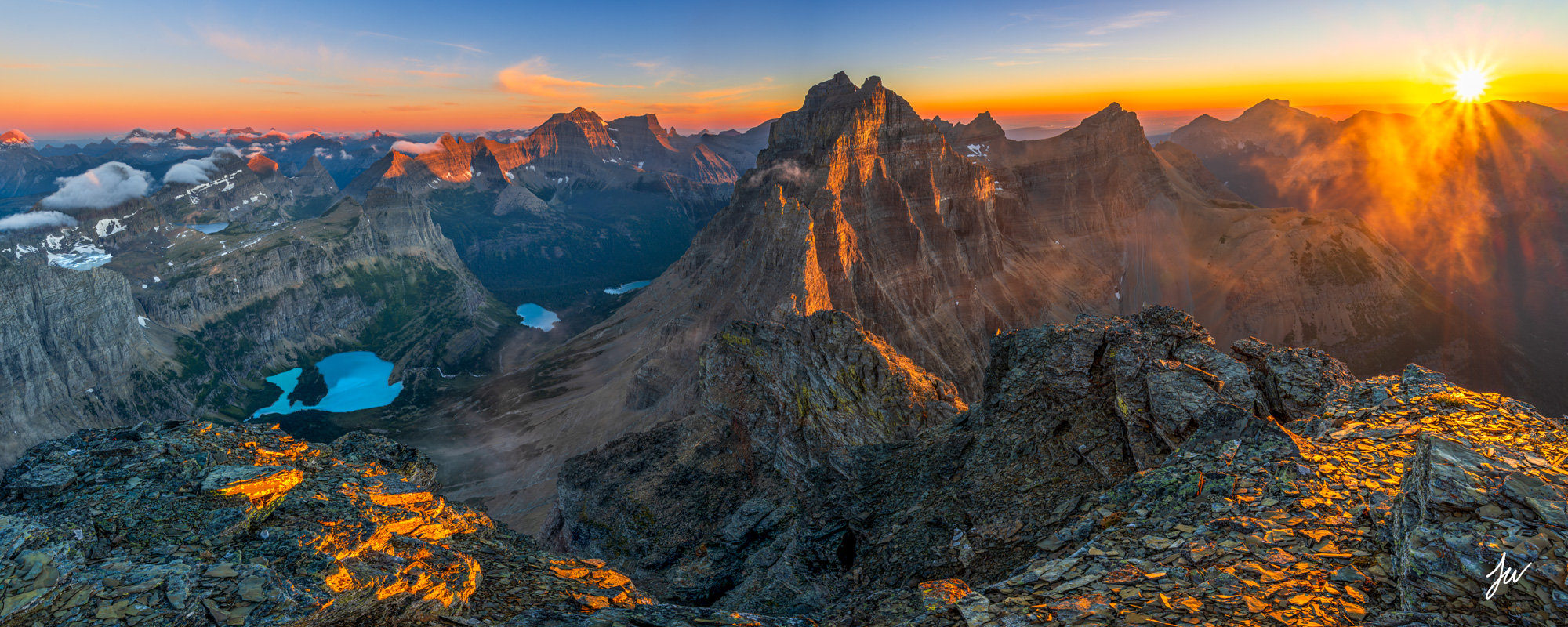 Sunrise atop Glacier National Park in Belly River area. 