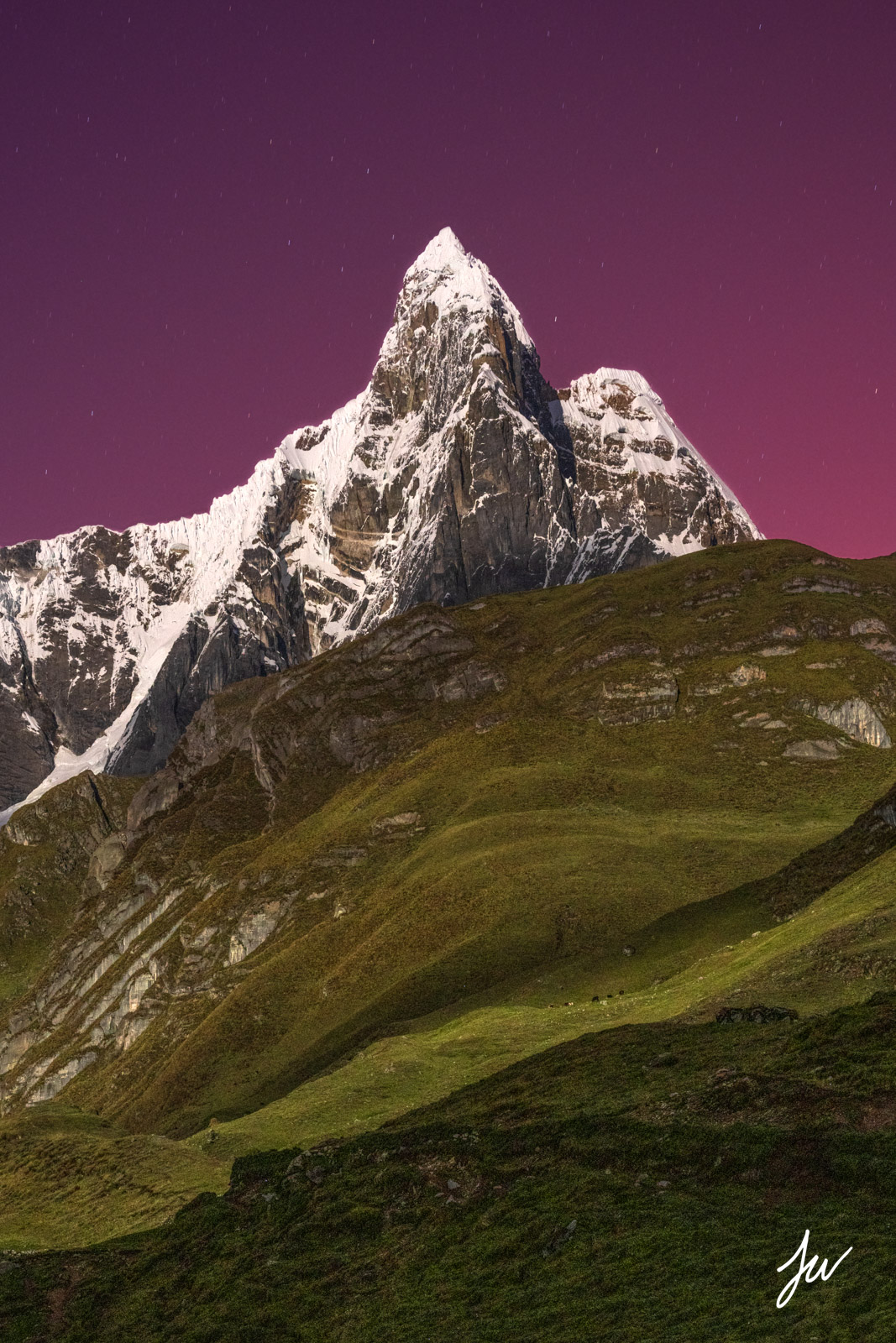 Lunar alpenglow on Jirishanca on the Cordillera Huayhuash.