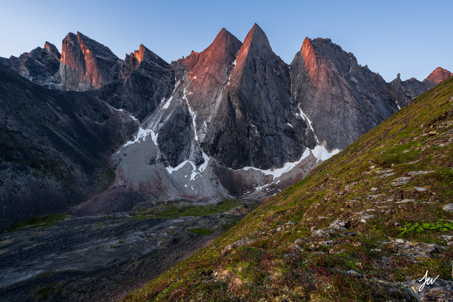 Maidens sunrise light in the Arrigetch Peaks in Gates of the Arctic National Park, Alaska.
