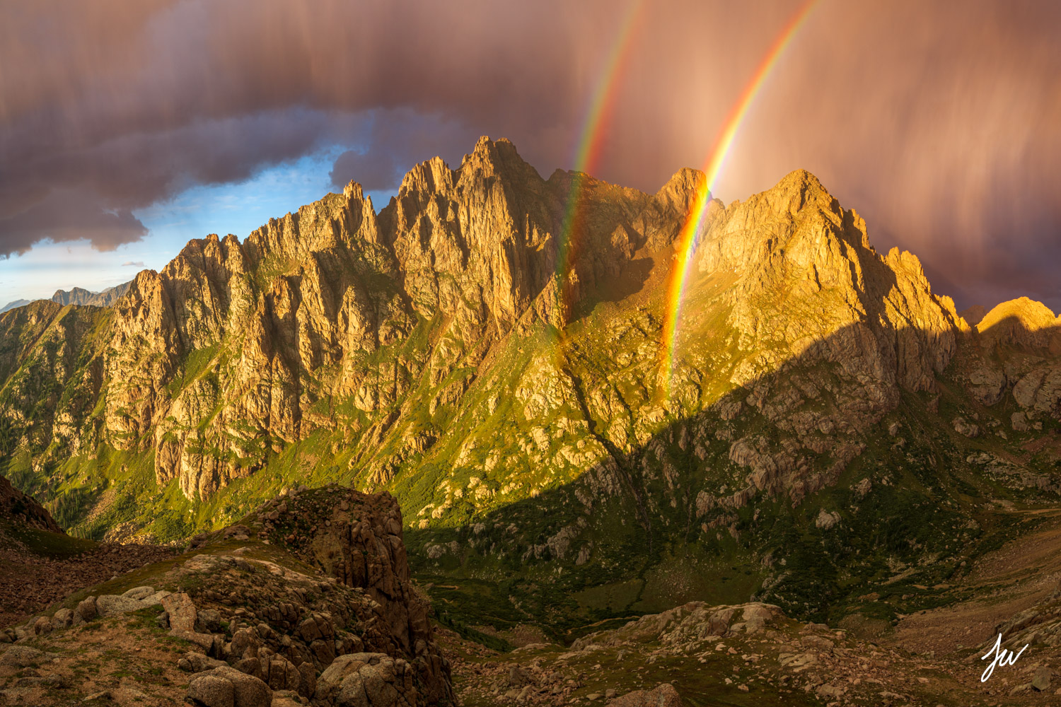 Colorado rockies sunset in a summer thunderstorm.