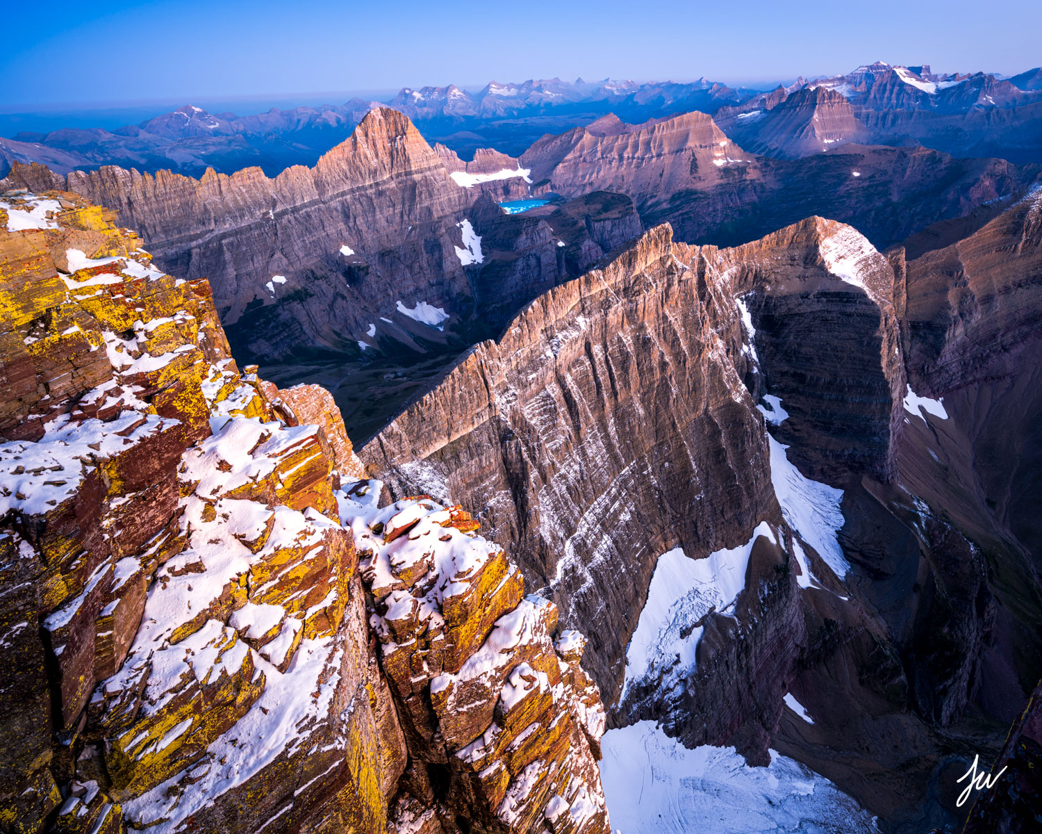 Dawn light over Glacier as shot from the summit of Mount Siyeh.