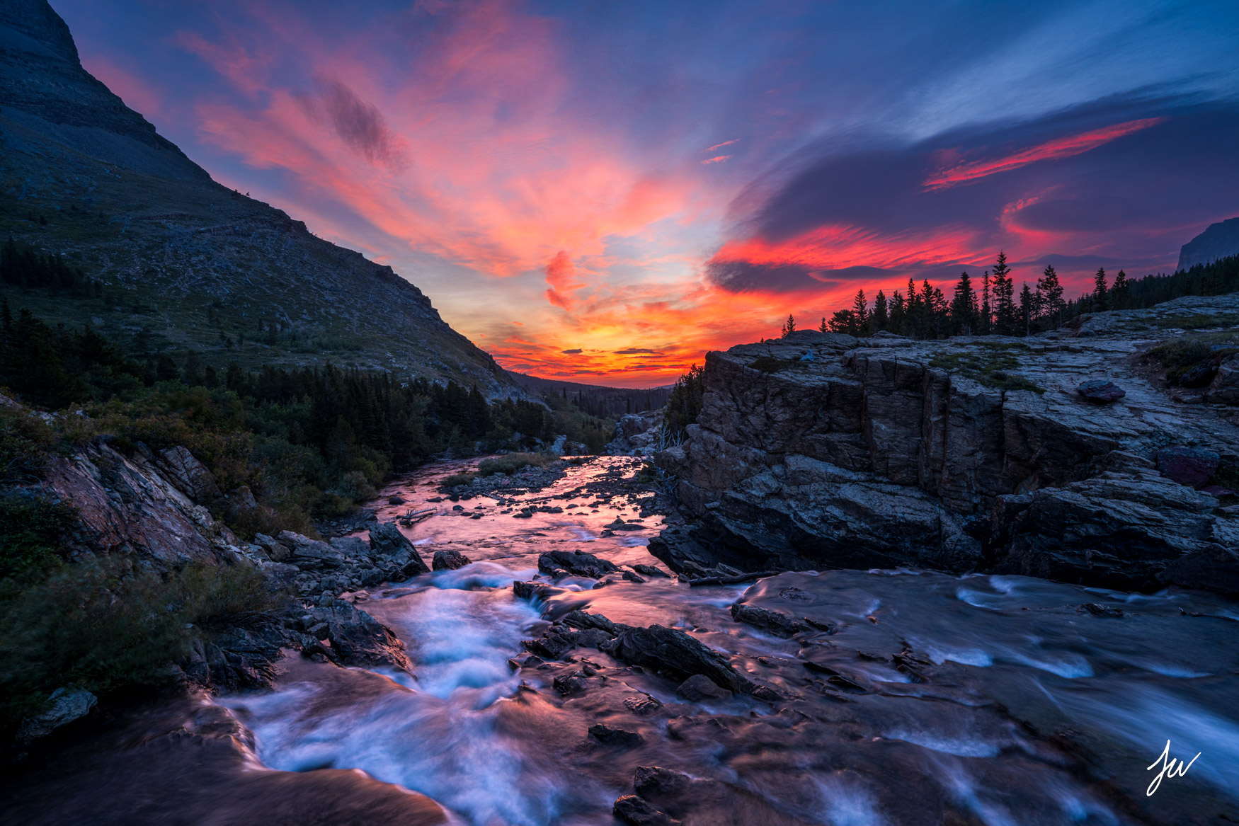 Swiftcurrent Falls sunrise in Many Glacier in Montana. 